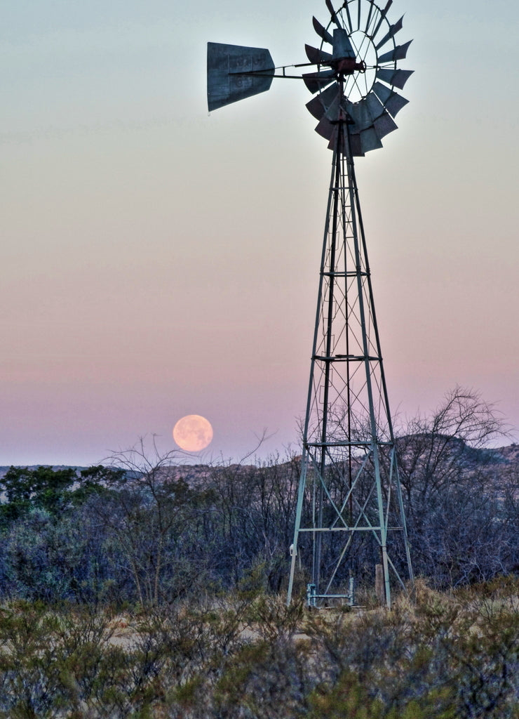 Windmill and moonset near Sanderson Texas