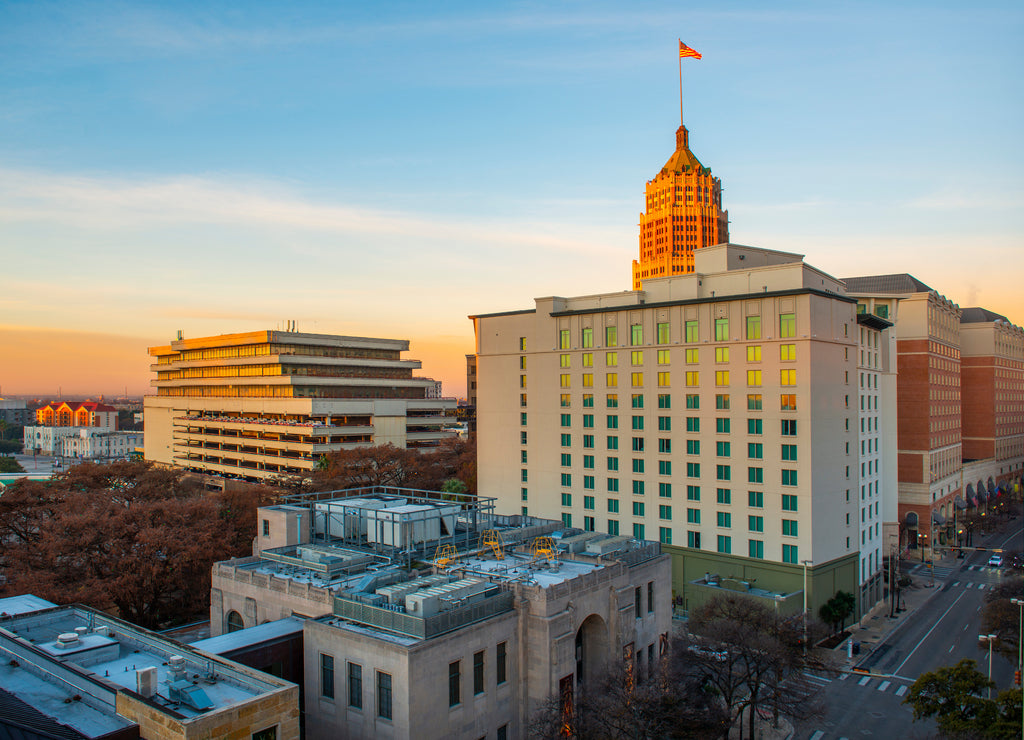 San Antonio city skyline including Hotel Contessa, Westing Riverwalk, Tower Life Building and San Antonio Museum of Art at sunrise in downtown San Antonio, Texas, USA