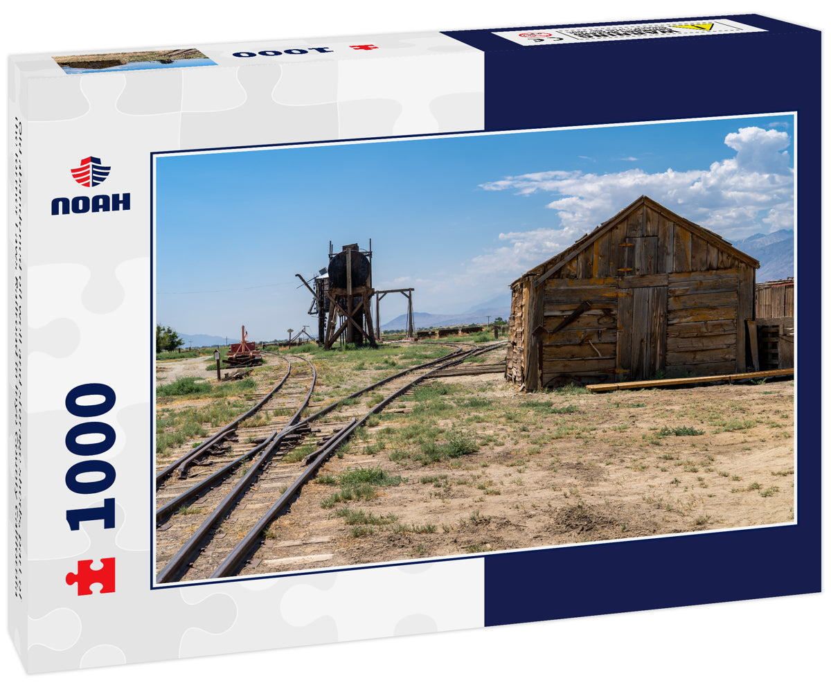 Old abandoned oil well and storage sheds, part of the former Laws Railroad in Inyo County California