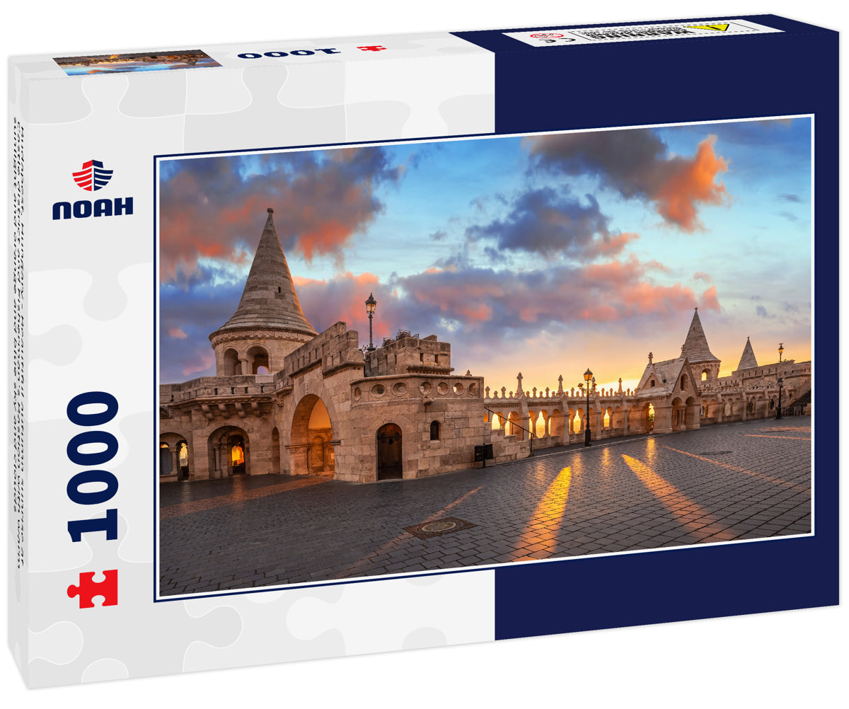 Budapest, Hungary - Beautiful autumn sunrise at Castle district and Fisherman's Bastion with warm sunlight and orange and blue sky and clouds