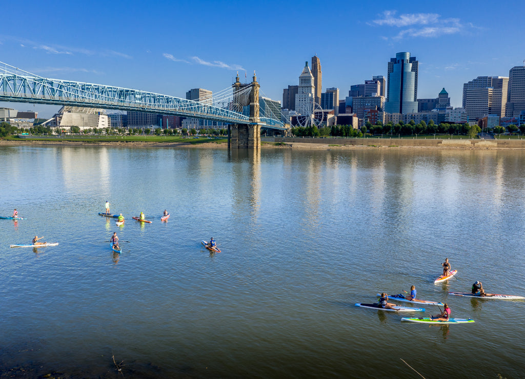 Panoramic view of Cincinnati downtown with the historic Roebling suspension bridge over the Ohio river