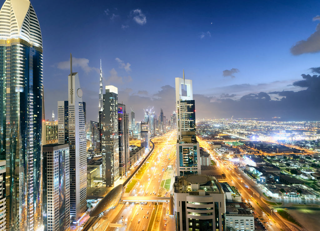 Downrtown skyline along Sheikh Zayed Road at night, Dubai, United Arab Emirates