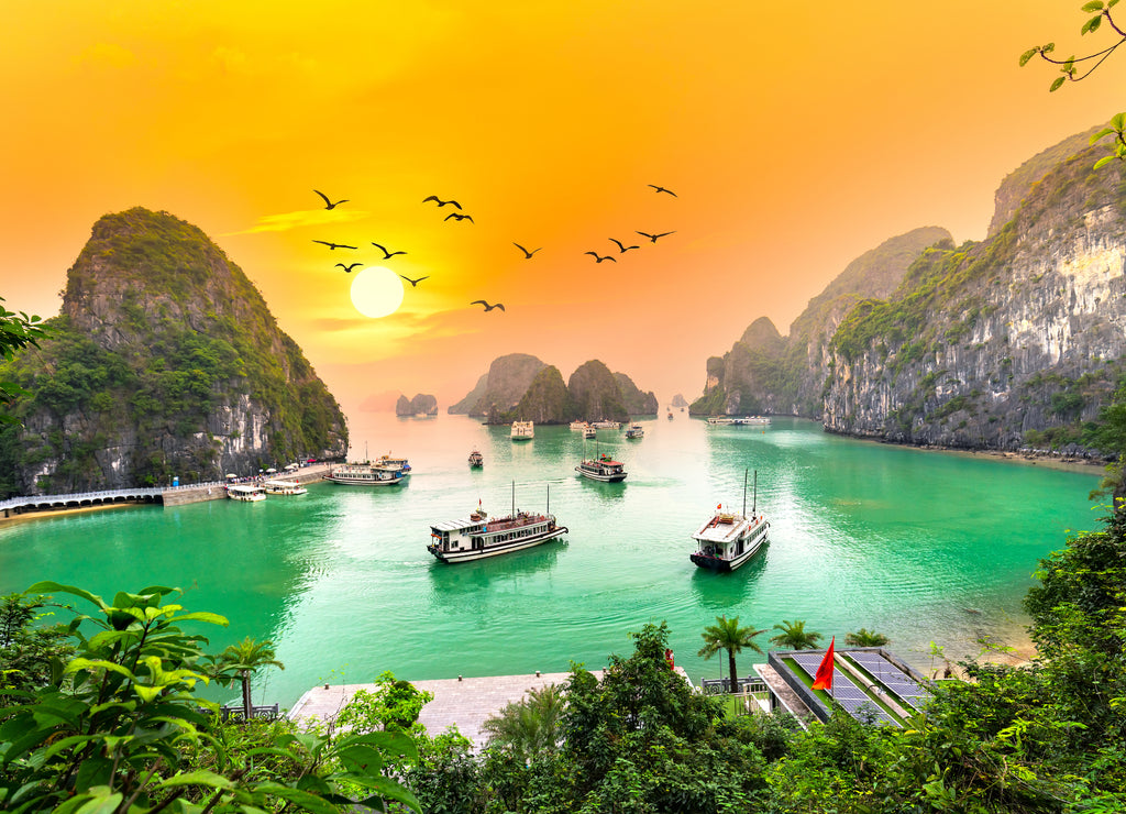 Dreamy sunset landscape Halong Bay, Vietnam view from adove. This is the UNESCO World Heritage Site, a beautiful natural wonder in northern Vietnam