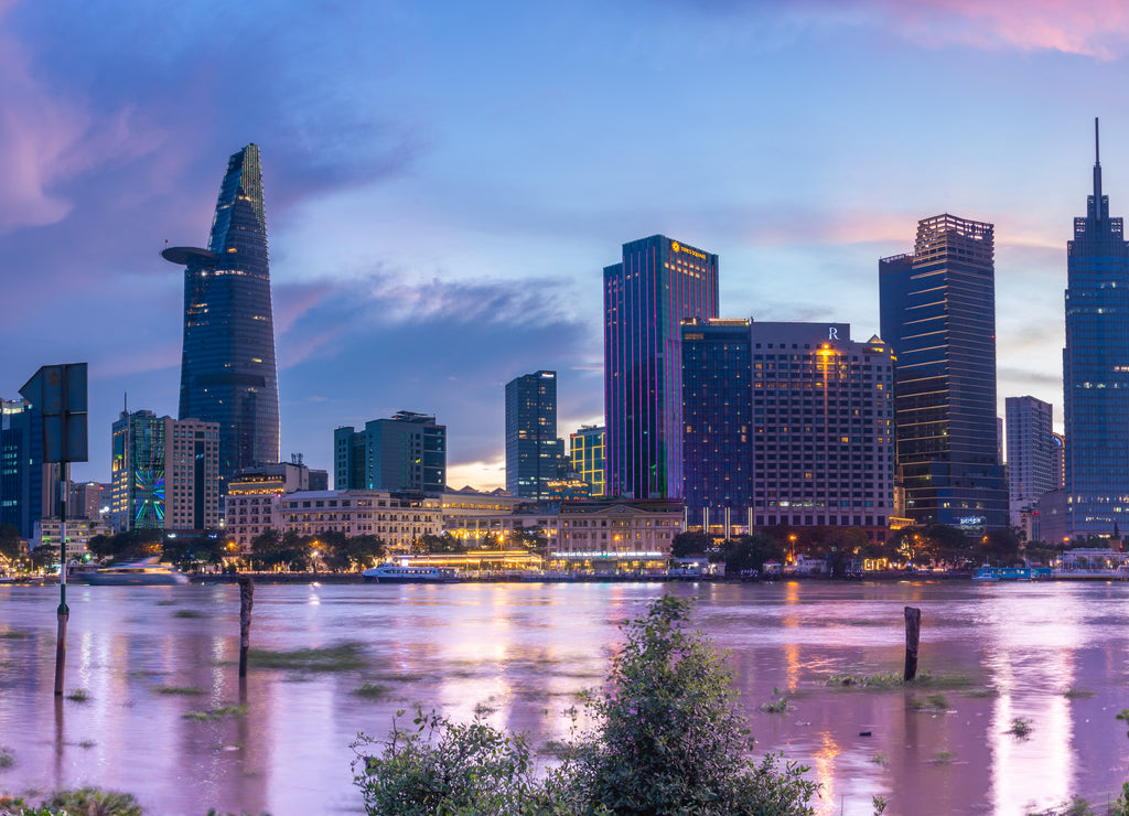 Bitexco Financial Tower building, buildings, roads and Saigon river in Ho Chi Minh city