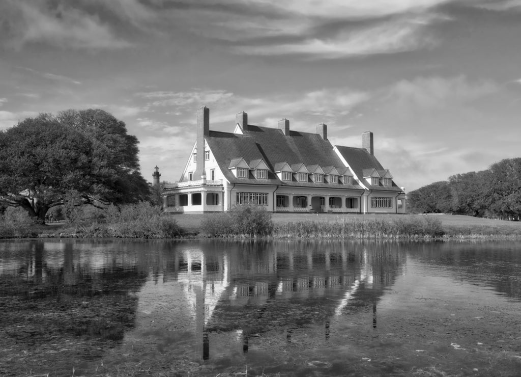 The historic Whalehead Club, built in 1920, in Corolla, North Carolina has been restored to its original grandeur. The former home is now a museum in black white