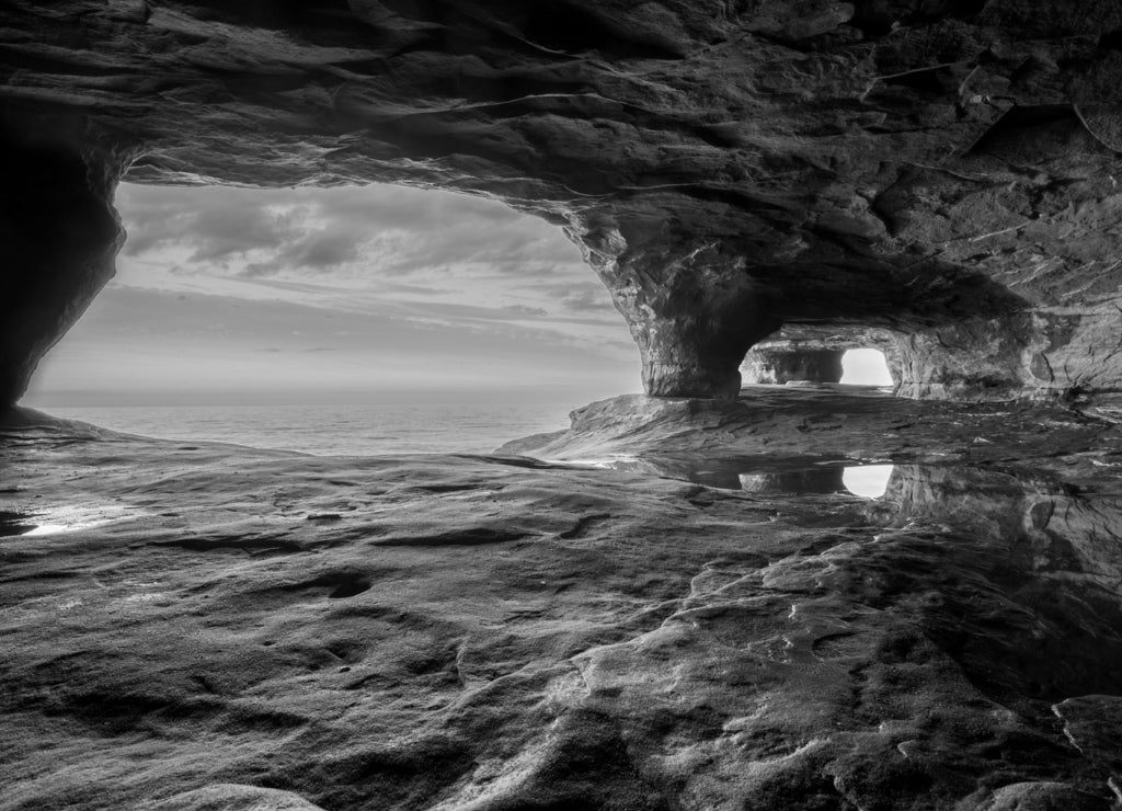 Sea Cave on Lake Superior at Sunset in black white