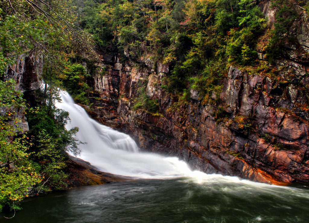 Hurricane Falls located in the Tallulah Gorge near Clayton Georgia. The gorge is approximately 2 miles long and features rocky cliffs up to 1,000 feet high and has six separate waterfalls falls