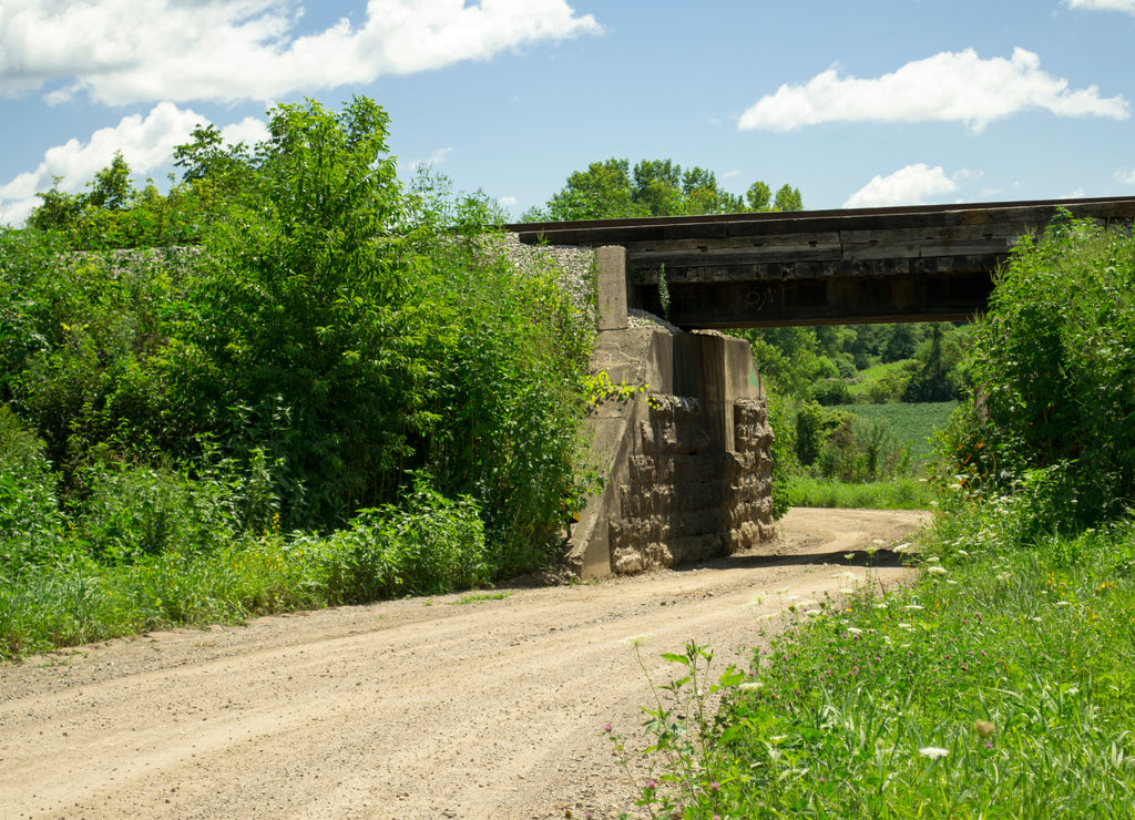 Railroad Track Bridge over Gravel Road in Jasper County, Iowa USA