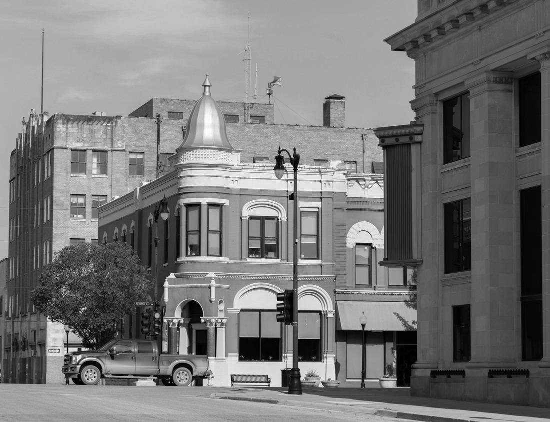 Noah Jigsaw Puzzle Zeromski Street in Radom, Poland. Pedestrian street in the city center. St. Jacob's steeple in the background in black white 1000 pieces