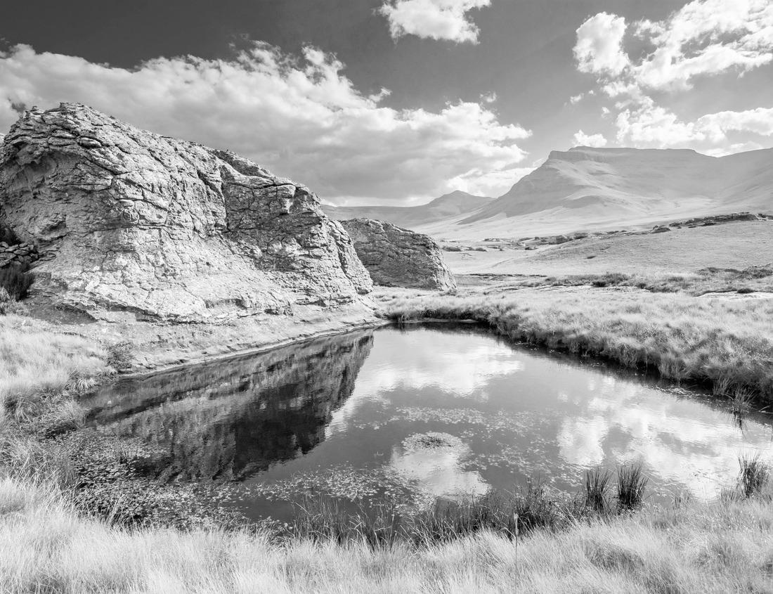 Noah Jigsaw Puzzle Waves crashing onto an iceberg, near the coast of Newfoundland and Labrador, Canada in black white 1000 pieces