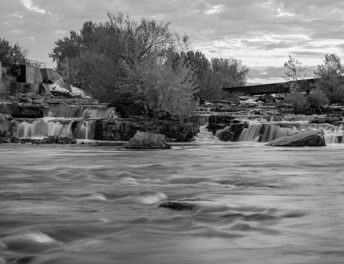 Noah Jigsaw Puzzle Clear Water in the River Vathy Argaki with Stones at the Bottom Feeding the Dipotamos Reservoir in the Potamos National Park surrounded by Reeds and Gray Rocks (Kornos, Larnaca District, Cyprus) in black white 1000 pieces