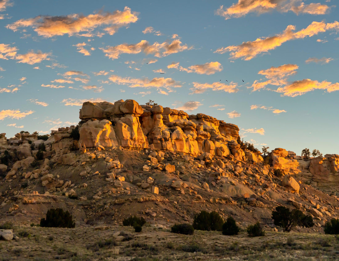 Sunrise on a Rocky Mesa in the New Mexico landscape with small puffy clouds in the blue sky 1000pc Puzzle