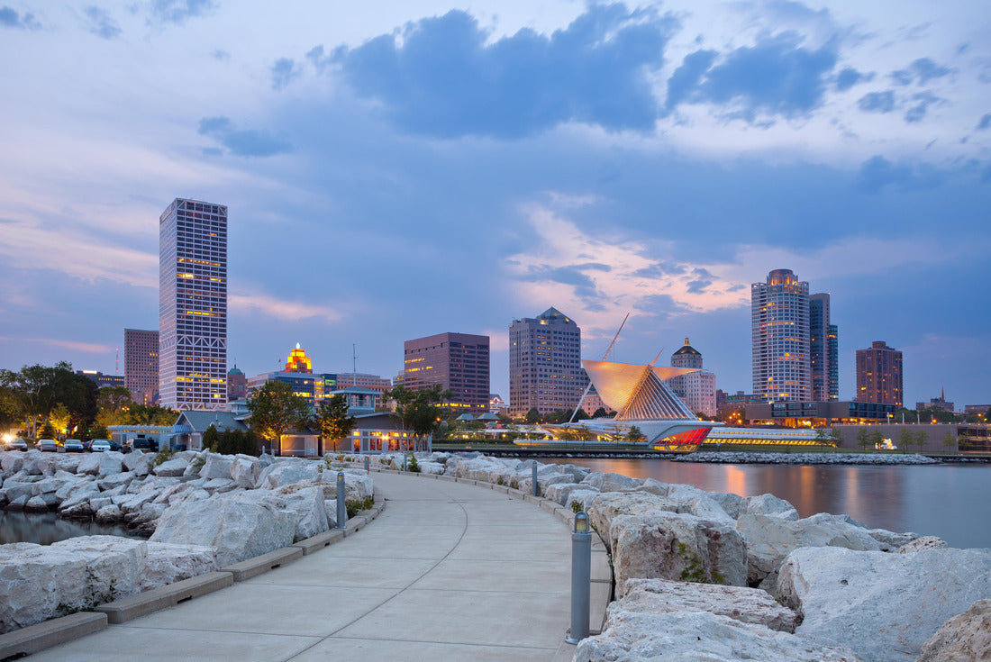 Noah Jigsaw Puzzle City of Milwaukee skyline. Image of Milwaukee skyline at twilight with city reflection in lake Michigan and harbor pier 2000 pieces