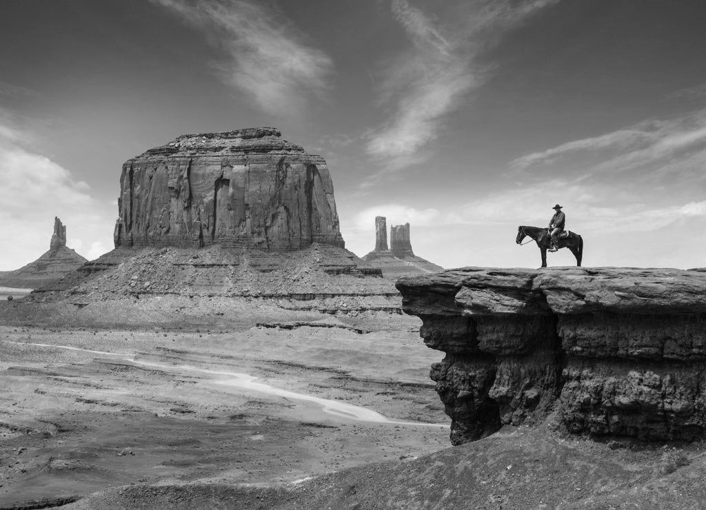 Monument Valley with Horseback rider ( john ford's point ) / Utah - USA in black white
