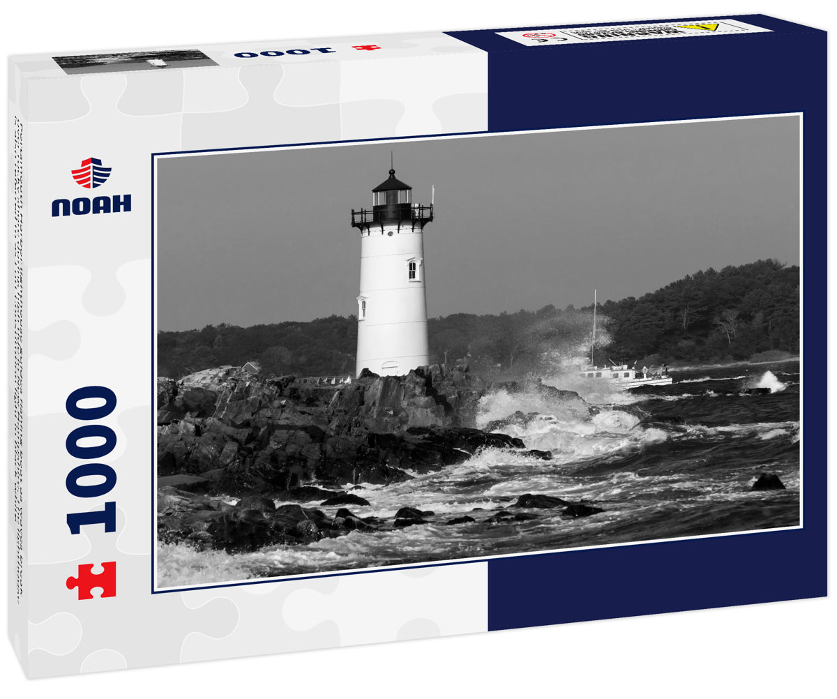 Portsmouth Harbor lighthouse guides fishing boat as waves break over rocky shore during high tide in New Hampshire. The lighthouse is also referred to as Fort Constitution light in black white
