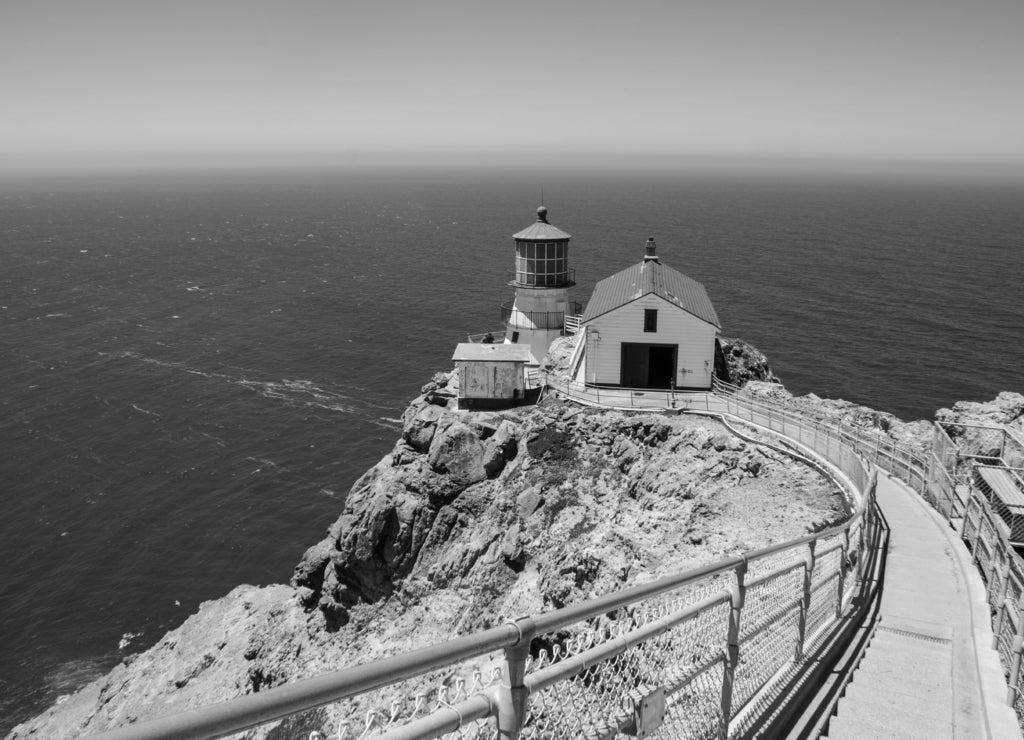 Stairway leading down to the historic Point Reyes Lighthouse in Marin County, California in black white