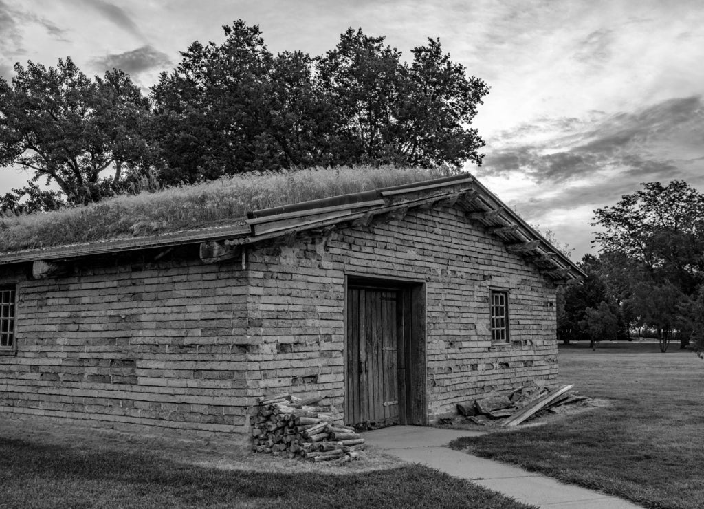 Military quarters made from mud bricks with a sod roof, Nebraska in black white