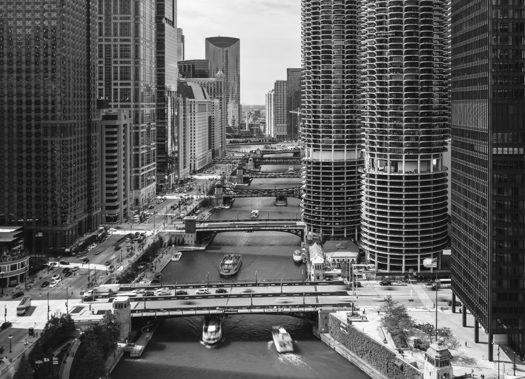 Chicago River with boats and traffic from above in the morning in black white