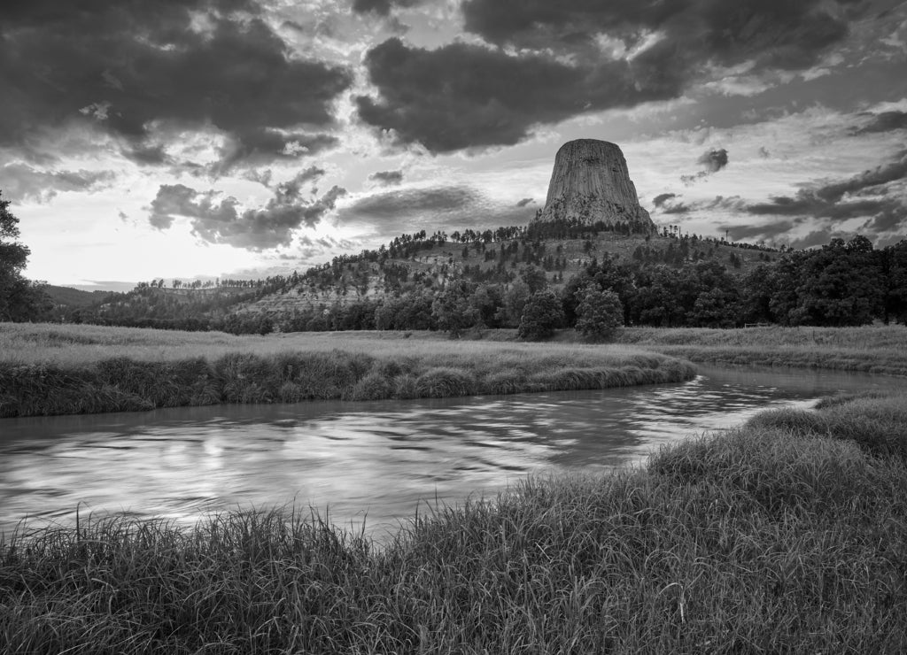 Sunset at Devils Tower National Monument with the Belle Fourche River in the foreground, Wyoming in black white