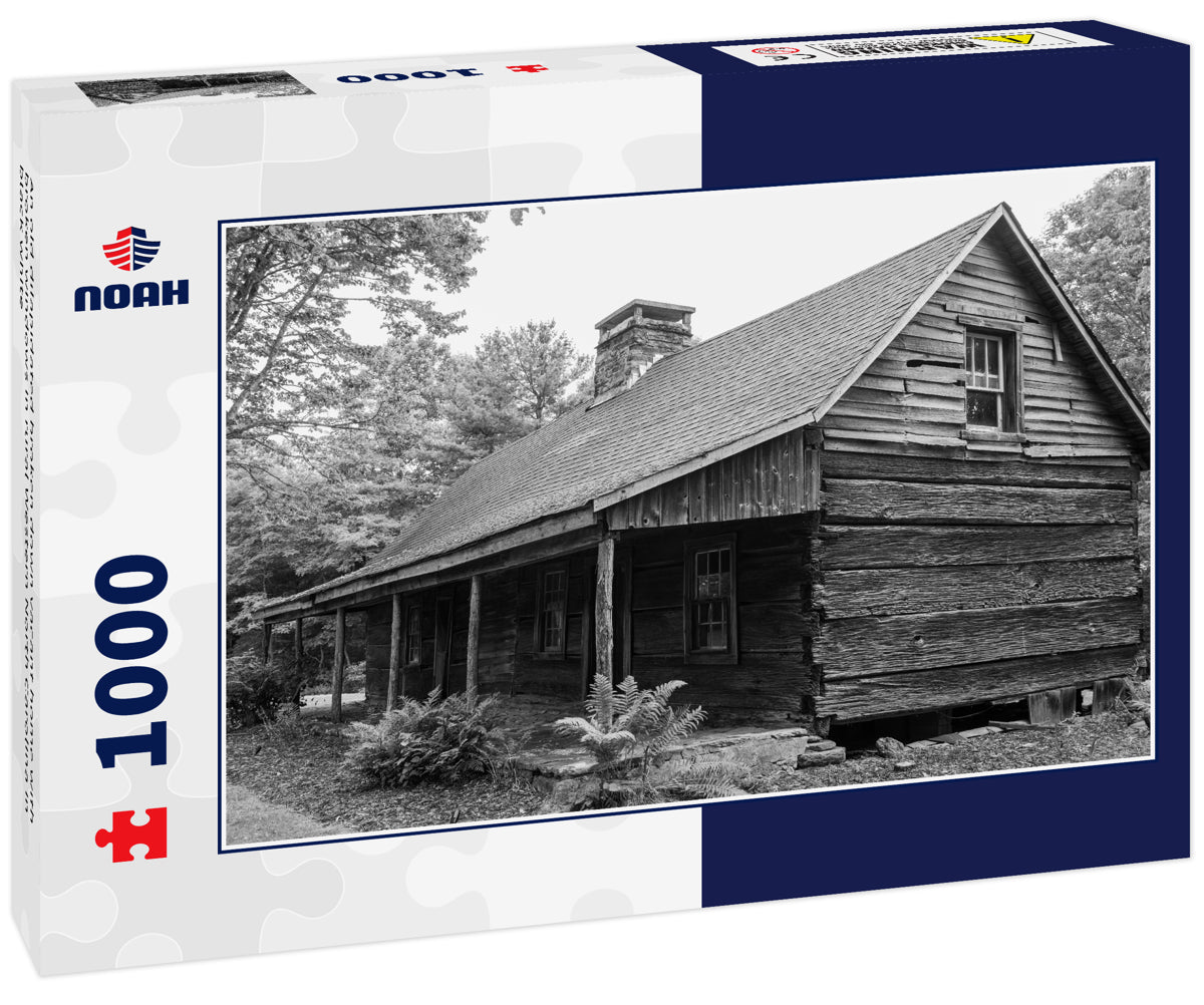 An old dilapidated broken down vacant home with broken windows in rural Western North Carolina in black white