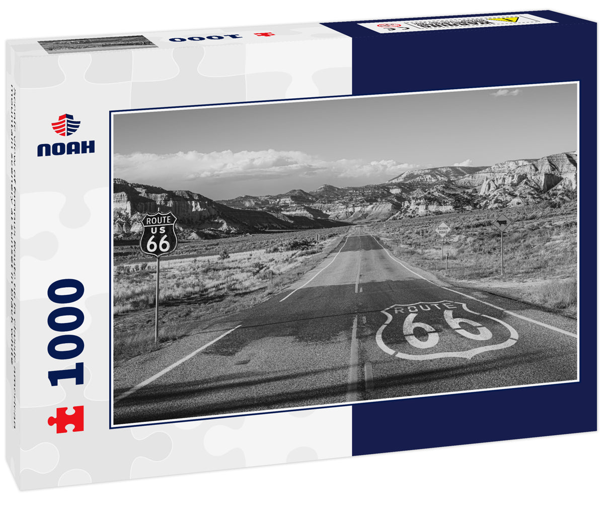 Scenic view of famous Route 66 in classic american mountain scenery at sunset in black white