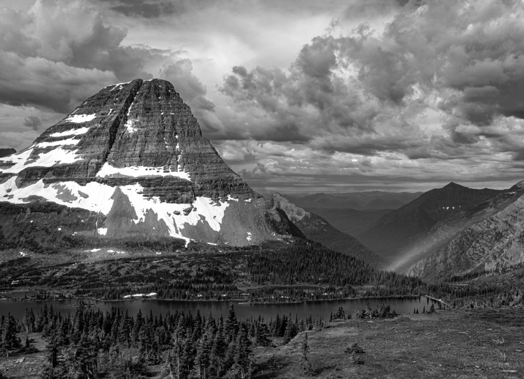 Rainbow after the storm at Bear Hat Mountain, Glacier National Park Montana in black white