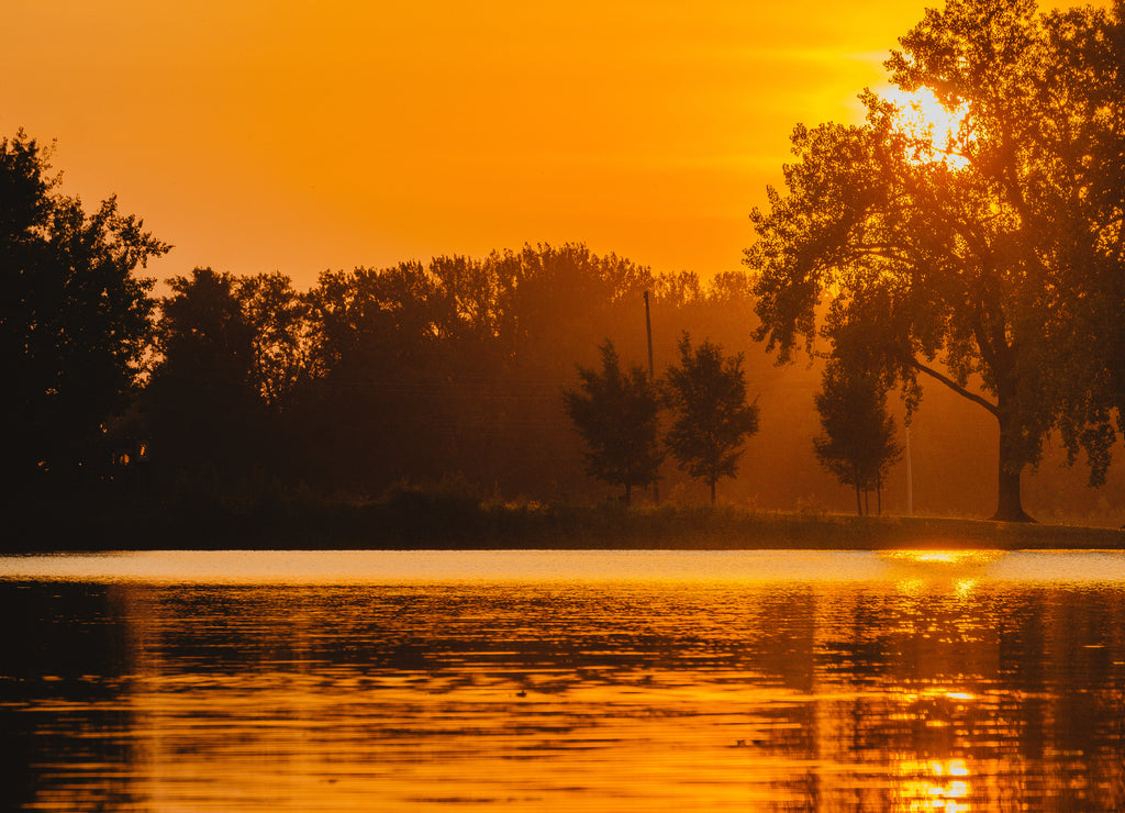 The Sun Rises over Gray's Lake in Des Moines, Iowa