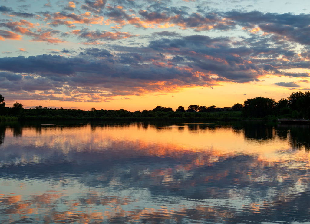 Sunset over lake in Ada Hayden Heritage Park, Ames, Iowa, USA