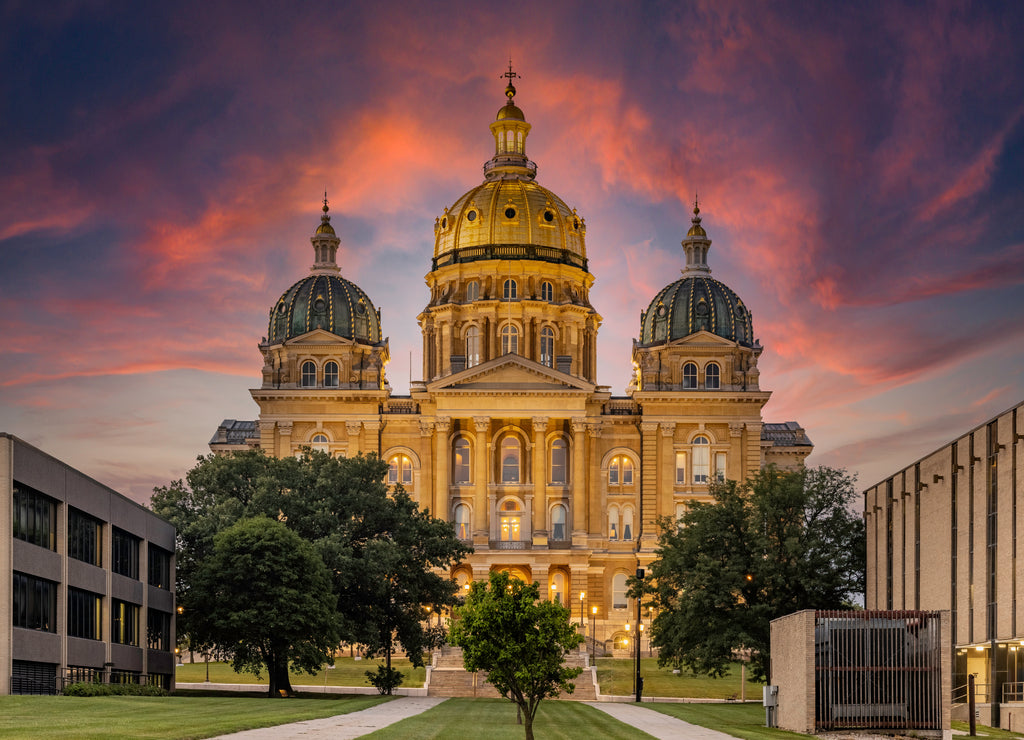 View of the Iowa State Capitol Building in Des Moines, Iowa, at sunset