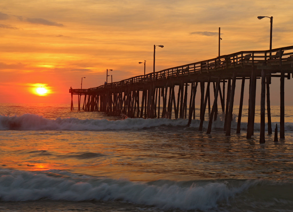 Sunrise by a fishing pier in North Carolina