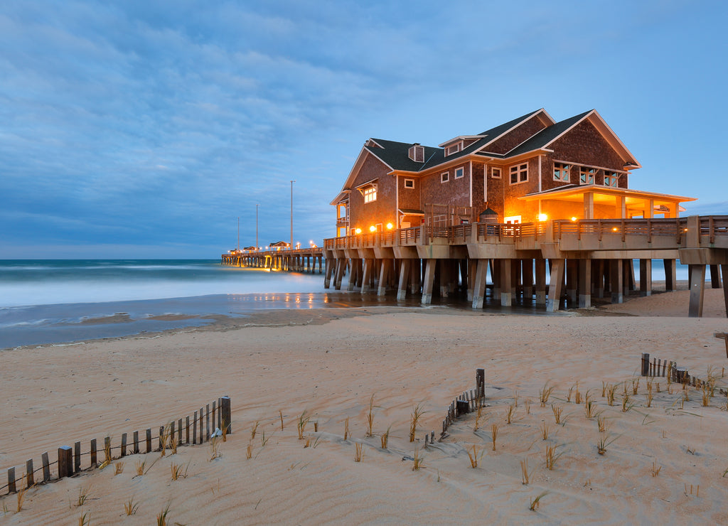 Jennette's Pier after sunset, Nags Head North Carolina. Originally built in 1939, Jennette’s is the oldest fishing pier on the Outer Banks, North Carolina USA