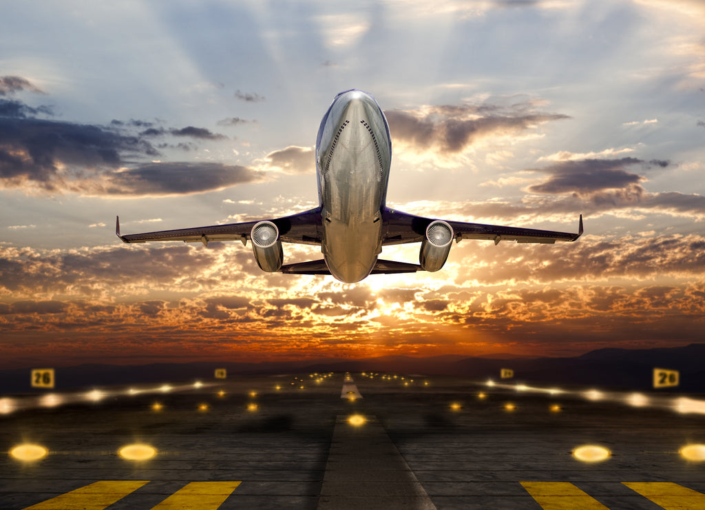 Airplane in sunset