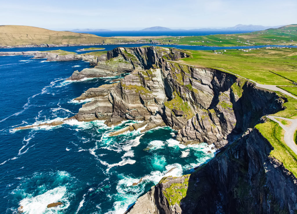 Amazing Kerry Cliffs lapped by waves, widely considered the most spectacular cliffs in County Kerry, Ireland