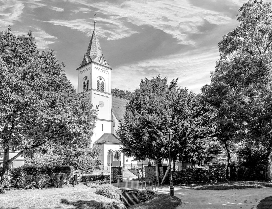 Noah Jigsaw Puzzle View through the pine trees into the deep blue waters of the Caldera of Crater Lake in Oregon in black white 1000 pieces