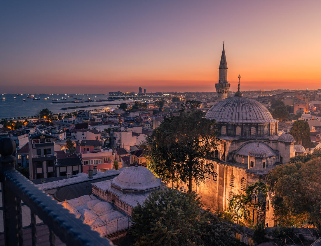Noah Jigsaw Puzzle Aerial night cityscape with small residential buildings, illuminated mosque with a minaret and distant lights of ships in the sea, Istanbul, Turkey 1000 pieces