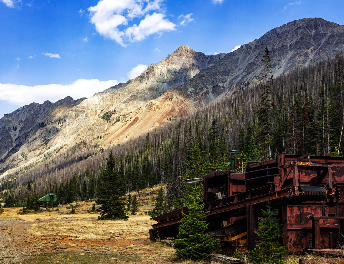 Rocky Mountain landscape and abandoned rusting mining equipment in the deserted mining town of Kirwin Wyoming 1000pc Puzzle