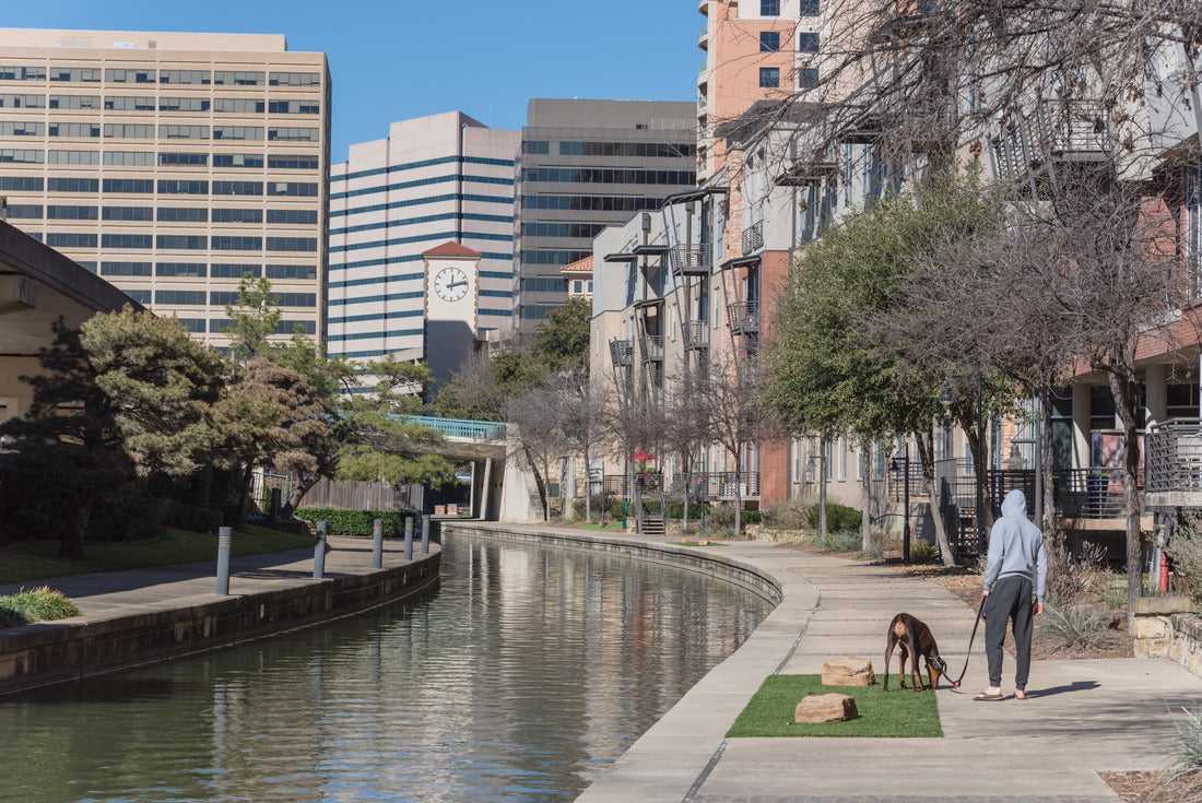 Noah Jigsaw Puzzle Back view of man in hoody walking dog along Mandalay Canal in Irving, Texas, USA 2000 pieces