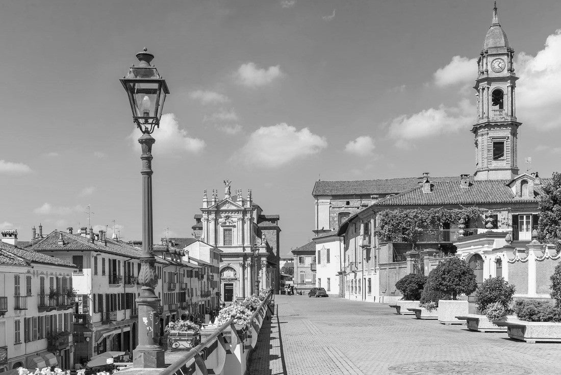 Promenade along the old colorful houses, church and lampposts under a blue sky in the city of Bra in Piedmont, northern Italy 2000pc PuzzleBlack and White