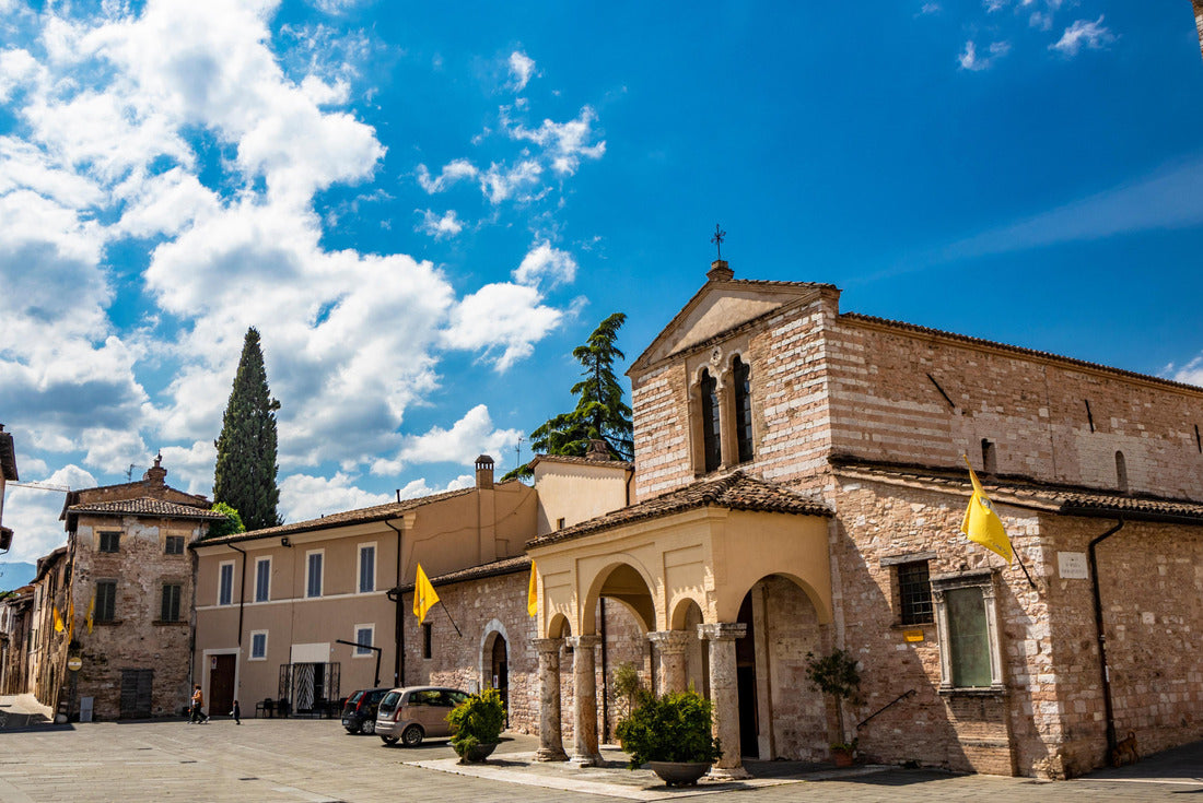 The Basilica of Santa Maria Infraportas, an old medieval church with tower. The yellow flag of one of the districts. In Foligno, Perugia, Umbria, Italy 2000pc Puzzle