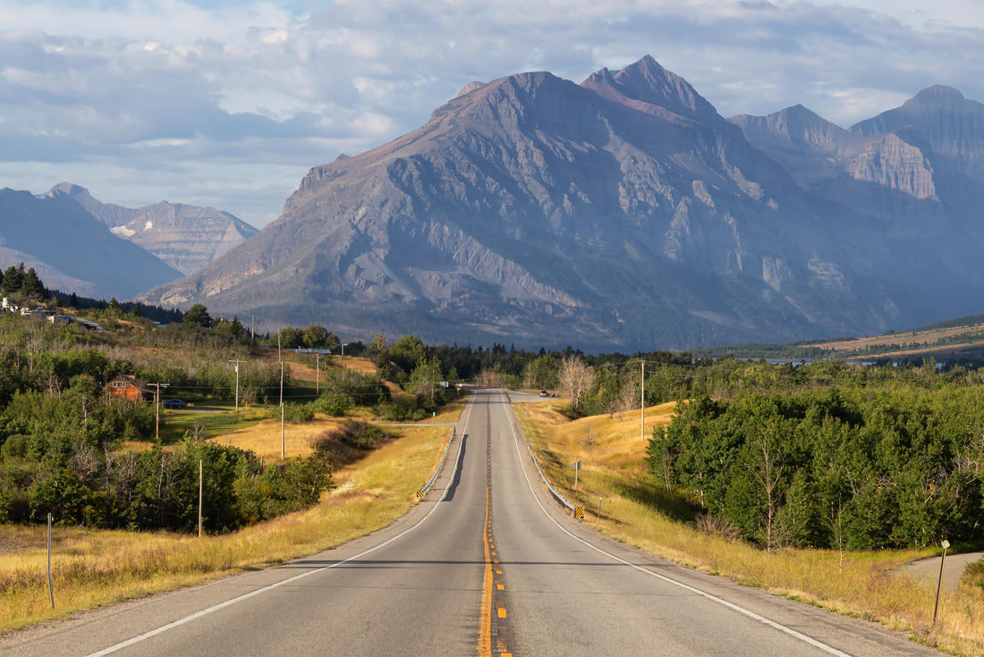 Beautiful View of Scenic Highway with American Rocky Mountain Landscape in the background during a Cloudy Summer Morning. Taken in St Mary, Montana, United States 2000pc Puzzle