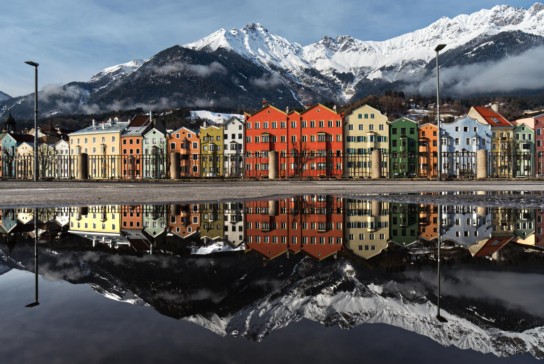 Water reflection of the distinctive colored house fronts of the Mariahilf district and Nordkette of Innsbruck, Austria captured from Marktplatz. This is the famous view of Innsbrucks cityscape 2000pc Puzzle