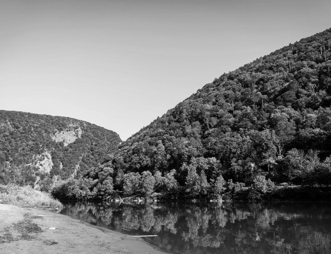 Valley Falls State Park near Fairmont in West Virginia on a colorful and bright spring day with redbud blossoms on the trees 1000pc PuzzleBlack and White