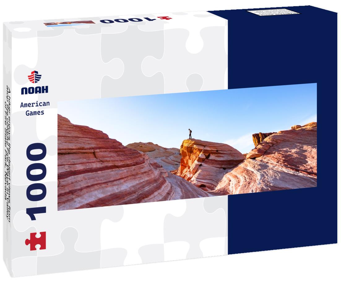 Noah Jigsaw Puzzle A hiker enjoys the desert views from atop the colorful Fire Wave in Valley of Fire State Park, Nevada panorama 1000 pieces