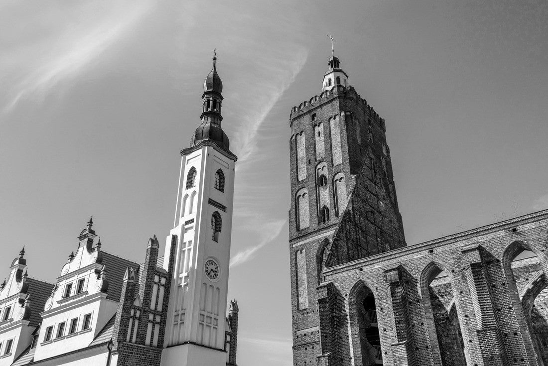 Noah Jigsaw Puzzle Poland, Guben, Gubin: Tower of old city hall and ruin of historic Parish church from below in the city center of the small town near German Polish border with blue sky in the background in black white 2000 pieces