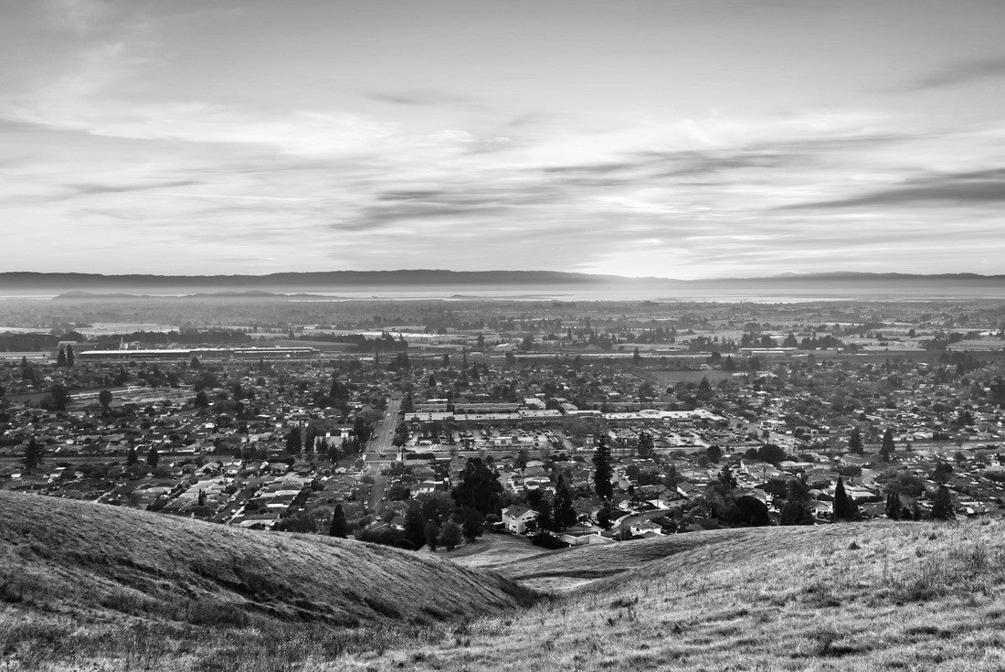 Sunset view of residential and industrial areas in East San Francisco Bay Area; green hills visible in the foreground; Hayward, California 2000pc PuzzleBlack and White