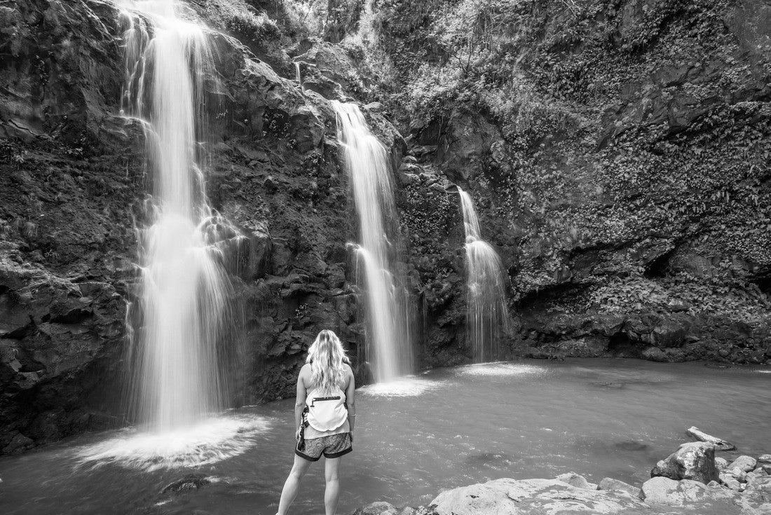 Blonde girl admires Three Bears Falls in Maui, Hawaii Hana Highway - Upper Waikani Falls. Road to Hana connects Kahului to the town of Hana Over 59 bridges, 620 curves, tropical rainforest 2000pc PuzzleBlack and White