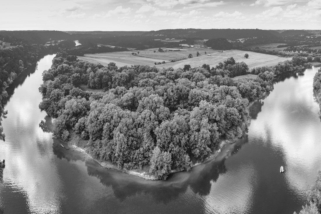 An aerial view of lush forestry and the bend of the Kentucky River with a boat on the water and cloud reflections in the sky 2000pc PuzzleBlack and White