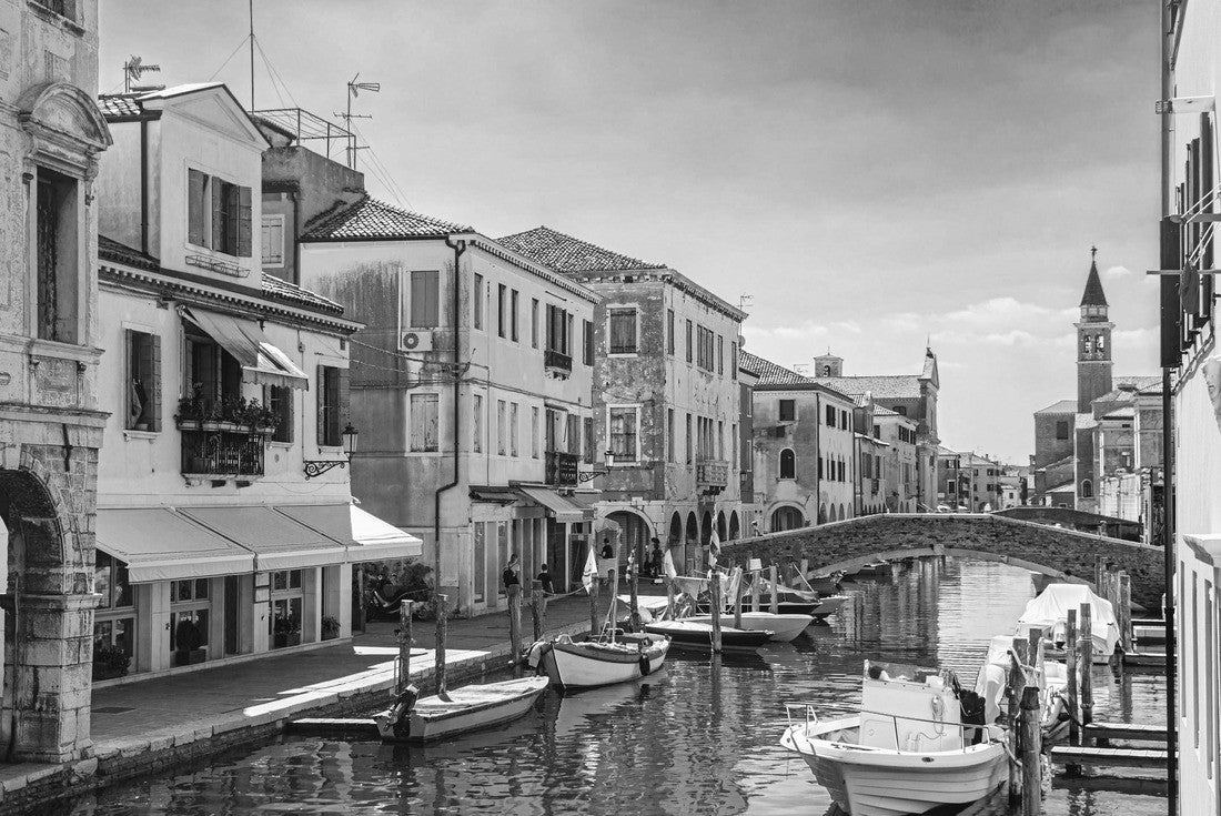Chioggia cityscape with narrow water channel Vena with colorful boats between old buildings and brick bridge, blue sky background in summer, Veneto region, northern Italy 2000pc PuzzleBlack and White