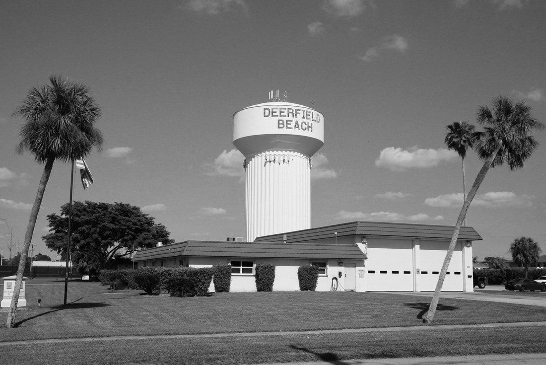 Deerfield Beach Water Tower Identifying Sign at Broward Sheriff and Fire Station Framed by Two Palm Trees, a Sidewalk and the Street in a Sunny Day in January 2000pc PuzzleBlack and White