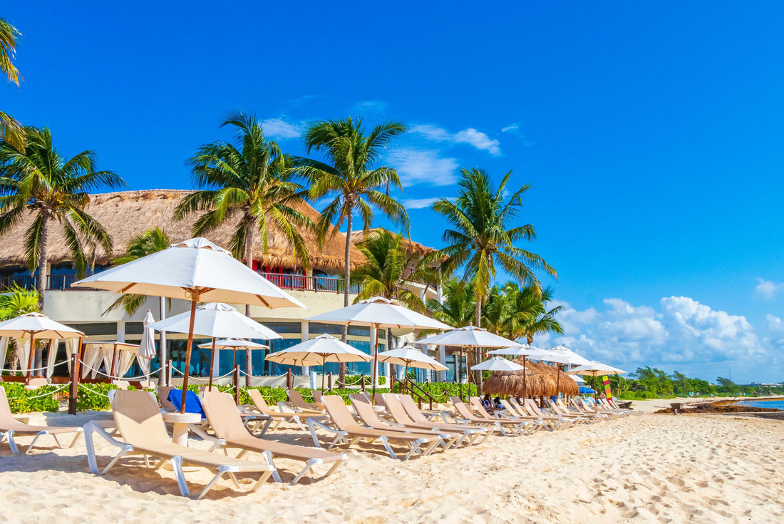 Palm umbrellas and sun loungers at the Riff Coco Beach Resort on the Mexican beach of Playa del Carmen, Mexico 2000pc Puzzle
